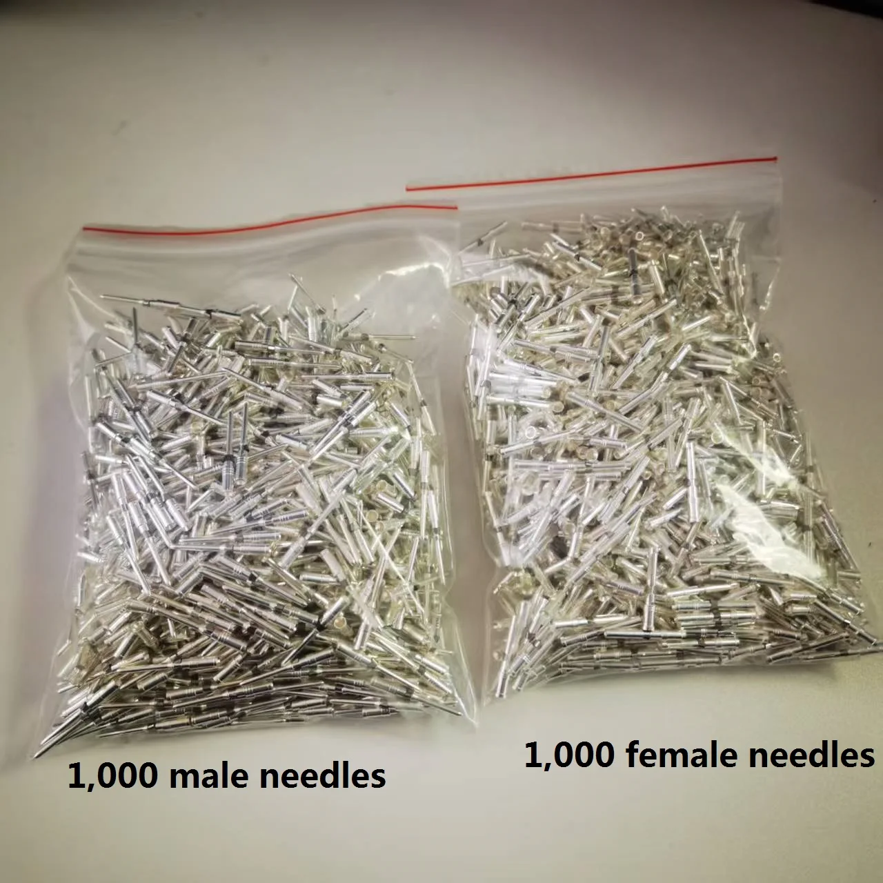 

1,000 male and female pins of heavy-duty connectors