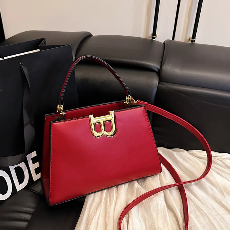 ​​Artisan Crafted Geometric Saddle Bag Women Textured Leather Crossbody Purse Museum Lunch Date Ready Statement Style Luxury