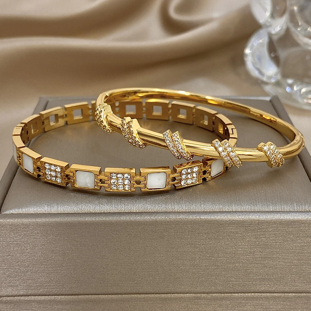 Freetry أنيقة الزركون الفولاذ المقاوم للصدأ الكفة سوار المرأة بسيطة هندسية الملتوية مطلية بالذهب الربيع الإسورة مجوهرات مقاومة للماء