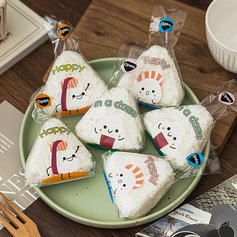 Bolsas de Sushi triangulares de dibujos animados, 50/100 Uds., algas marinas, Onigiri, bola de arroz, embalaje, molde para hacer Bento, accesorios bonitos para Sushi Lov
