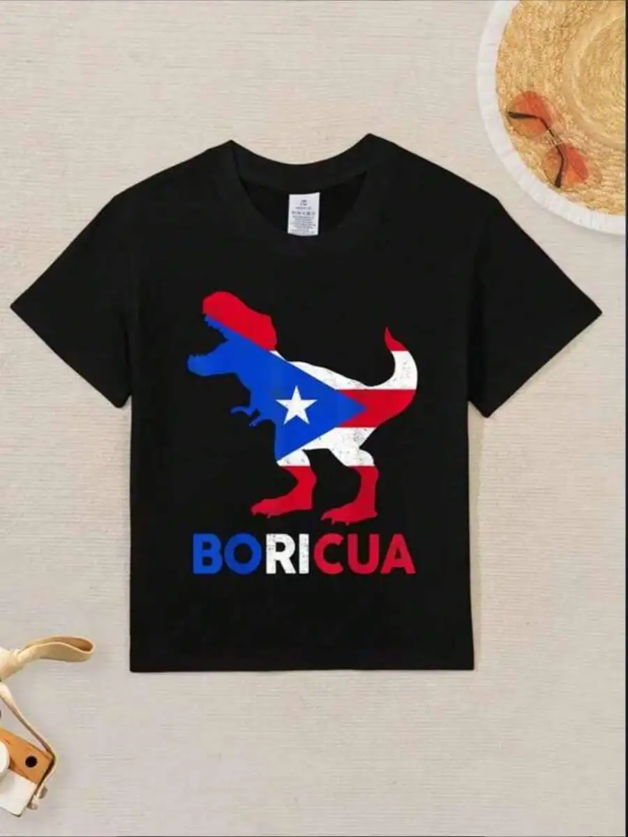 Black T-Shirt With A Puerto Rican Flag T-Rex Graphic, Showcasing A Vibrant Dinosaur Design And The Word BORICUA, Ideal For Summe