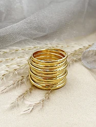 A French fashionable retro multi-layer spring ring with stainless steel ring for men and women as a daily party gift