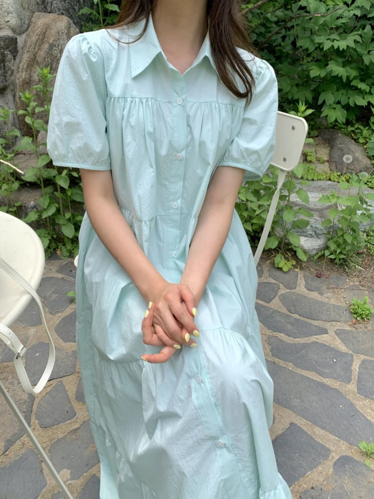 Vestido longo f de verão 2024, foado, com mangas bufantes, design com fendas, e, com botão único, saia em cam...