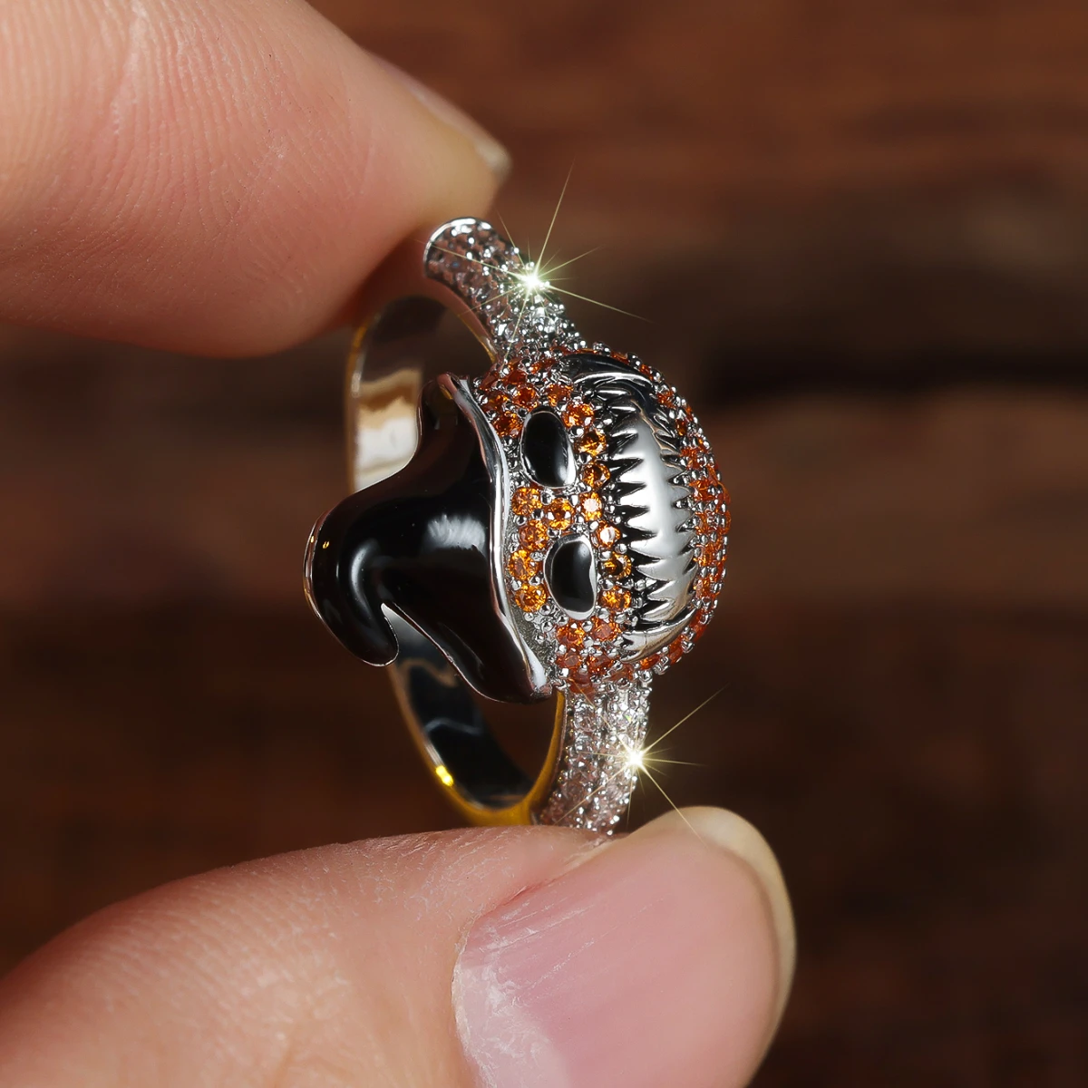 A unique and stylish women's ring featuring an orange and white synthetic zircon pumpkin wizard hat design, a captivating and qu