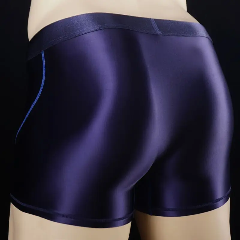 Calzoncillos elásticos para hombre, ropa interior Sexy de satén brillante con costuras, pantalones cortos deportivos ajustados