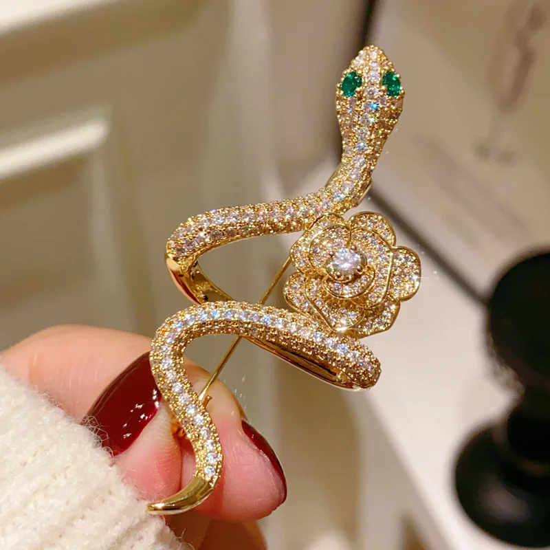 

New Chinese Zodiac Year Snake with Camellia Brooch for Women and Men Luxury Micro-inlaid Zircon Retro Corsage Accessories Pins