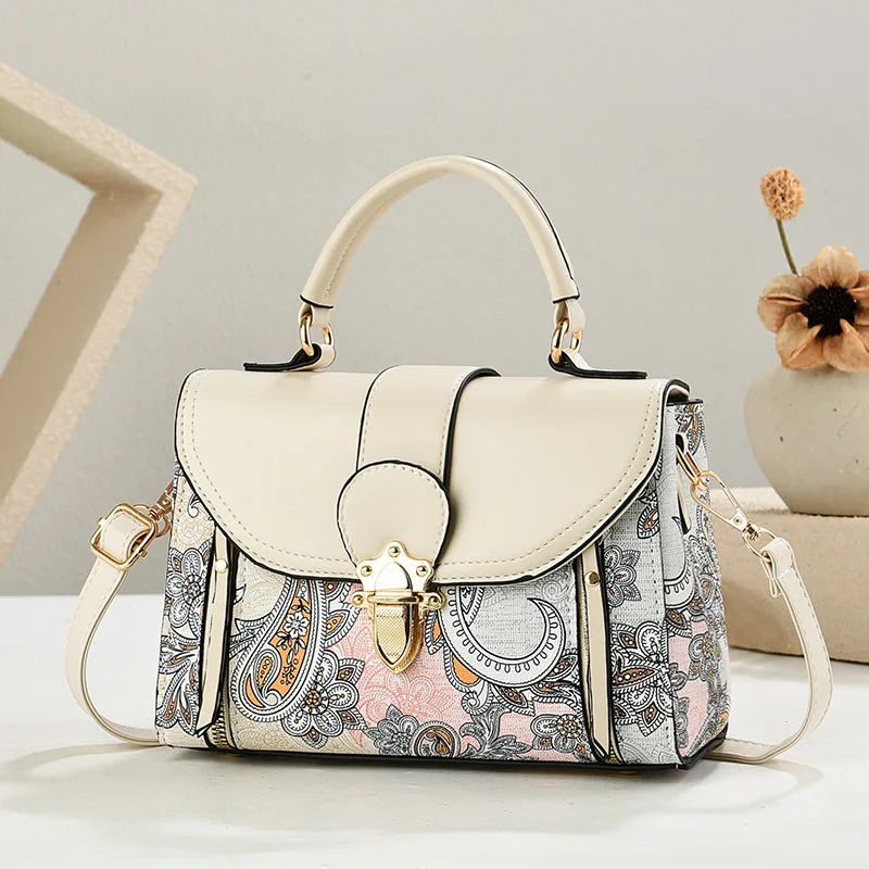 2025 Nouveau sac à main de style ethnique pour femme ; Sac pour femme de mode d'été ; Bandoulière à bandoulière simple bloquant les couleurs