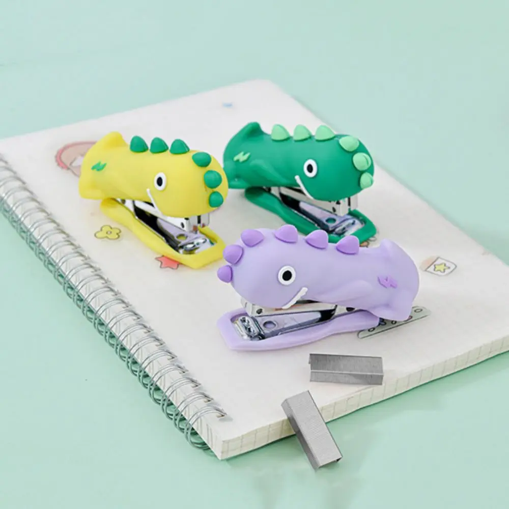 Mini grapadora de dinosaurios de dibujos animados, grapadora portátil decorativa de mano, herramienta de grapado de papel de silicona para escuela y oficina