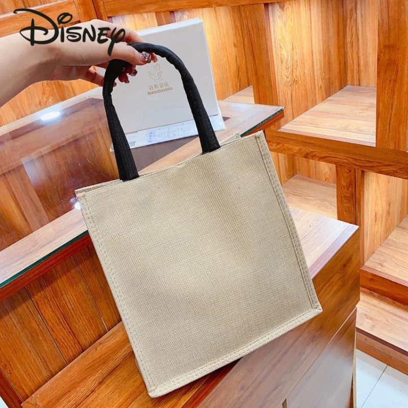 Disney-Bolso de mano de Mickey para mujer, bolsa de compras informal, versátil, de gran capacidad, de alta calidad, a la moda, novedad de 2023