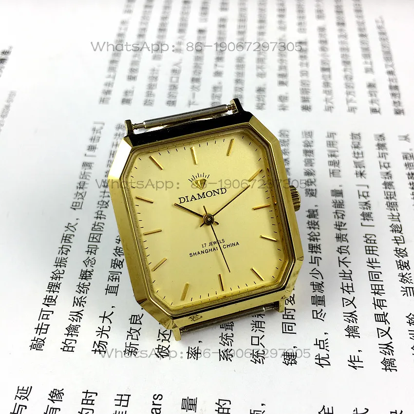 

Original stock, Shanghai Diamond brand square yellow shell strip fixed yellow surface manual mechanical watch, diameter 32mm
