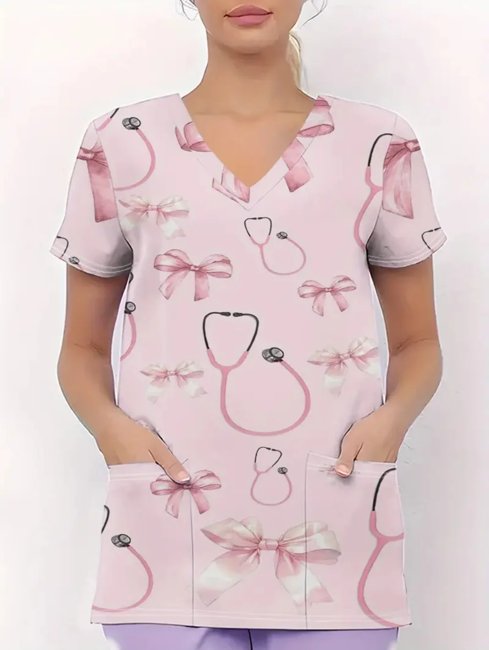 Uniforme de enfermera para mujer, bata de dentista con estampado rosa y lazo a la moda, moda de verano para mujer, manga corta con cuello en V y bolsillos, uniforme clínico