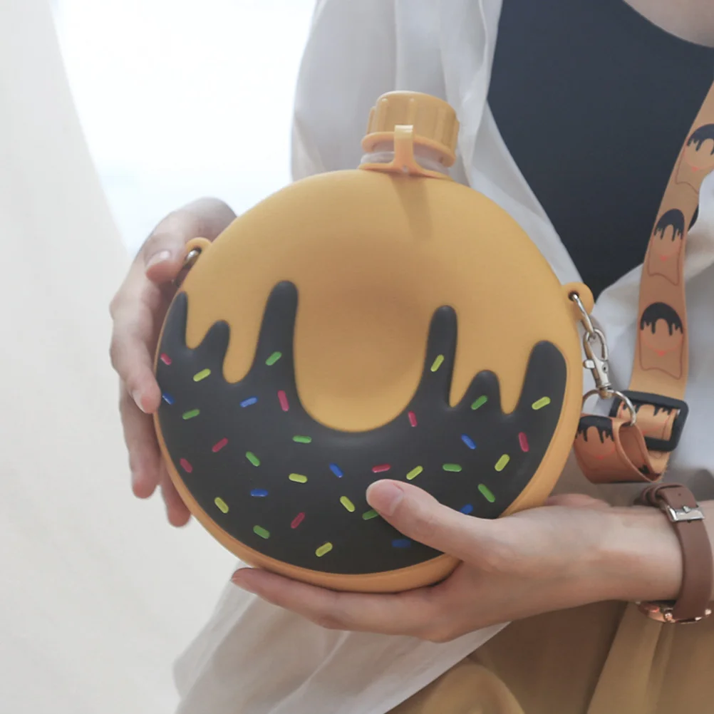 

1 pc 250Ml Doughnut Shape Silicone Water Bottle Portable Children Drinking Cup With Shoulder Strap Cartoon Cover Safe Pp
