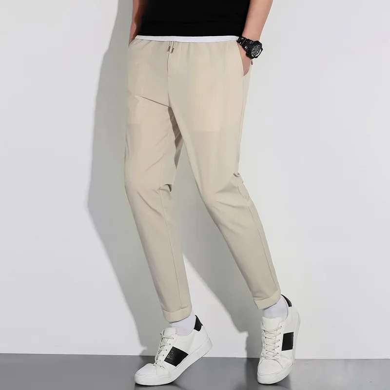 2023 Summer New Men's Clothing Solid Drawstring Straight Sleeve Sports Fashion Breathable Polyester Loose Long Pants JJ907