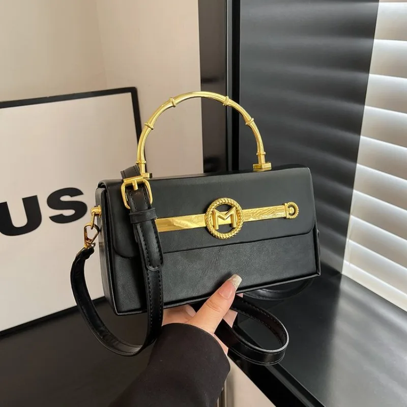 

Chic Minimalist Leather Handbag For Women Luxury Design Also Functions As A Highly Fashionable Diaper Bag