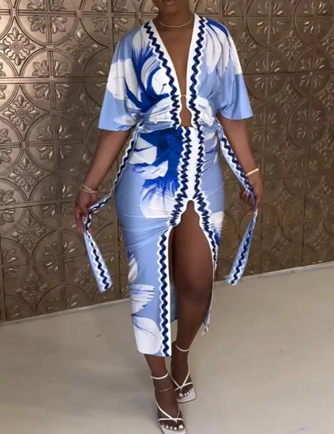 2025年春新作 レディース 花柄プリント プランジVネック ベルスリーブ ボディコンワンピース カジュアル スリムフィット スリット入りミディ丈ワンピース