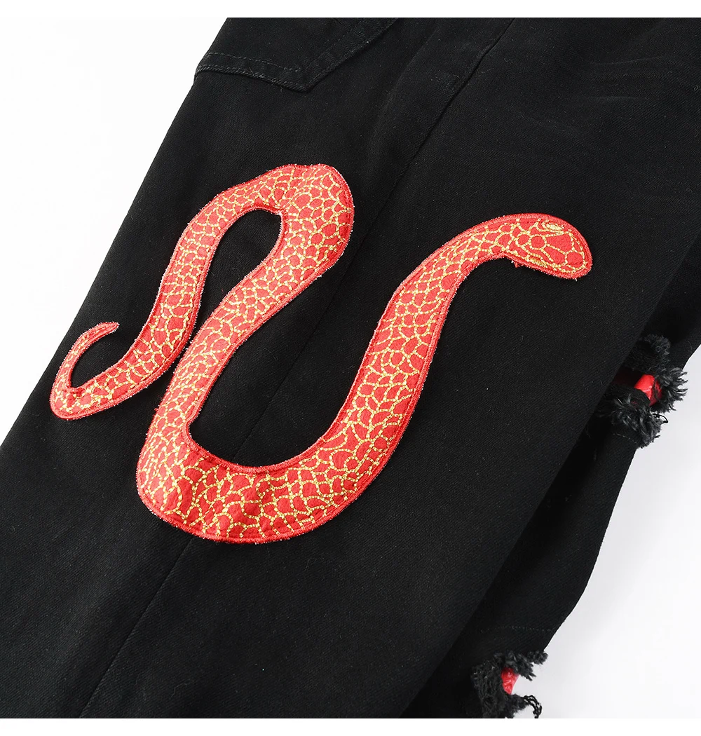 Herren Jeanshose aus Stretch-Denim mit schwarzer Schlangenstickerei, schmal geschnitten, konisch zulaufend, Bleistifthose mit Schlangenleder-Patch – Detail 9
