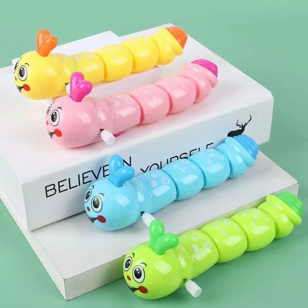 ألعاب تعليمية مضحكة على شكل عقارب الساعة، كاتربيلات ملونة، حيوانات لطيفة، هدايا أطفال بالقصور الذاتي، ألعاب متأرجحة، ألعاب عربة الأطفال