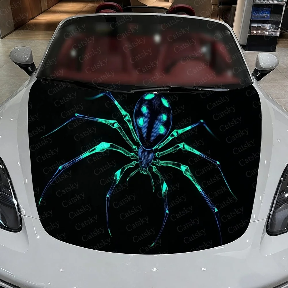 Glowing neon spider design on car hood, striking blue-green contrast for bold, eye-catching automotive styling.Car Vinyl Wrap, P
