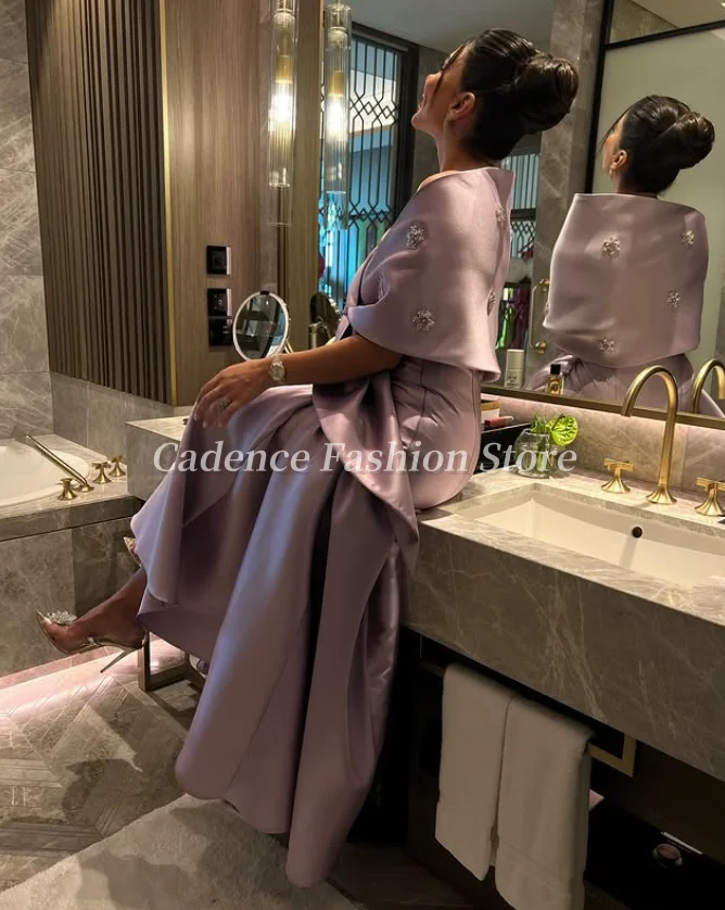 فساتين حفلة موسيقية عربية أنيقة بحورية البحر باللون الخزامى مخصصة فاخرة مطرزة في دبي فساتين سهرة رسمية للحفلات