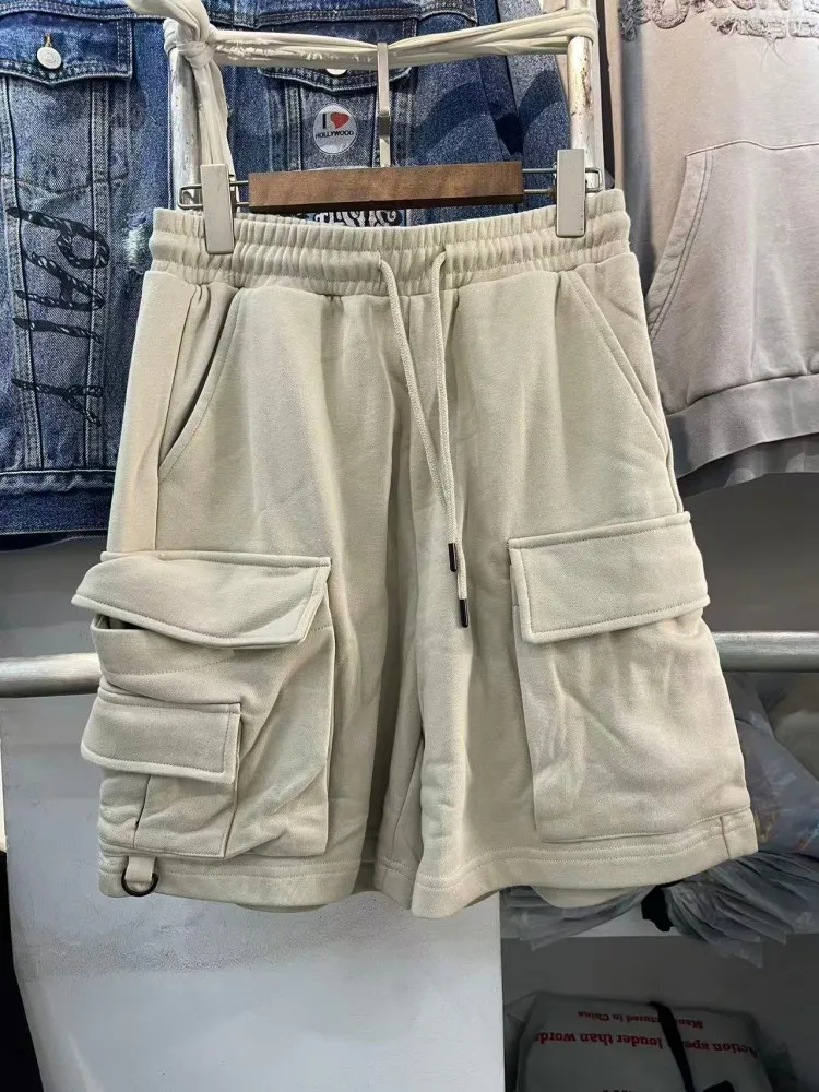 

Ретро-японские рабочие брюки из плотного хлопка (380 г/м²) с завязками и множеством карманов, свободного кроя.