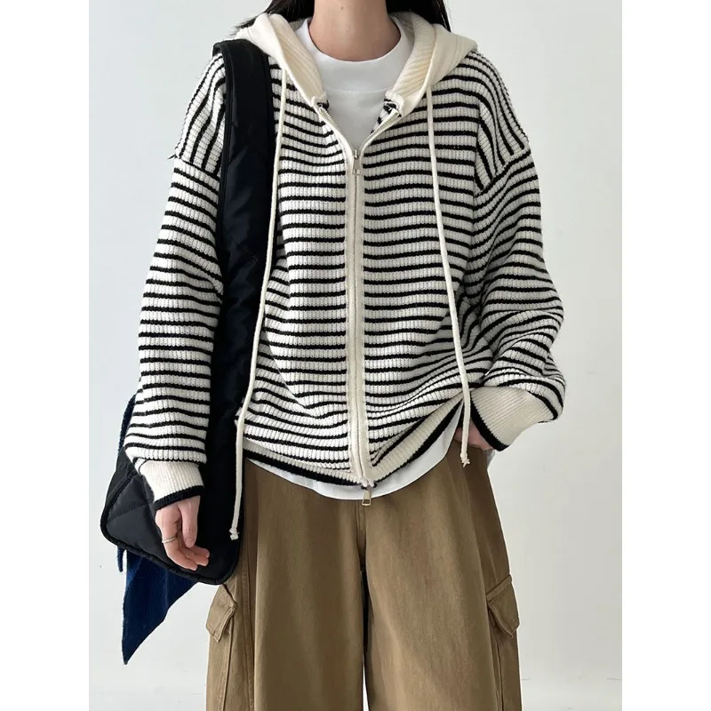 

Soft and Smooth Striped Sweater with Contrasting Colors Hooded and Drawstring Style Perfect for A Cozy Autumn Outfit