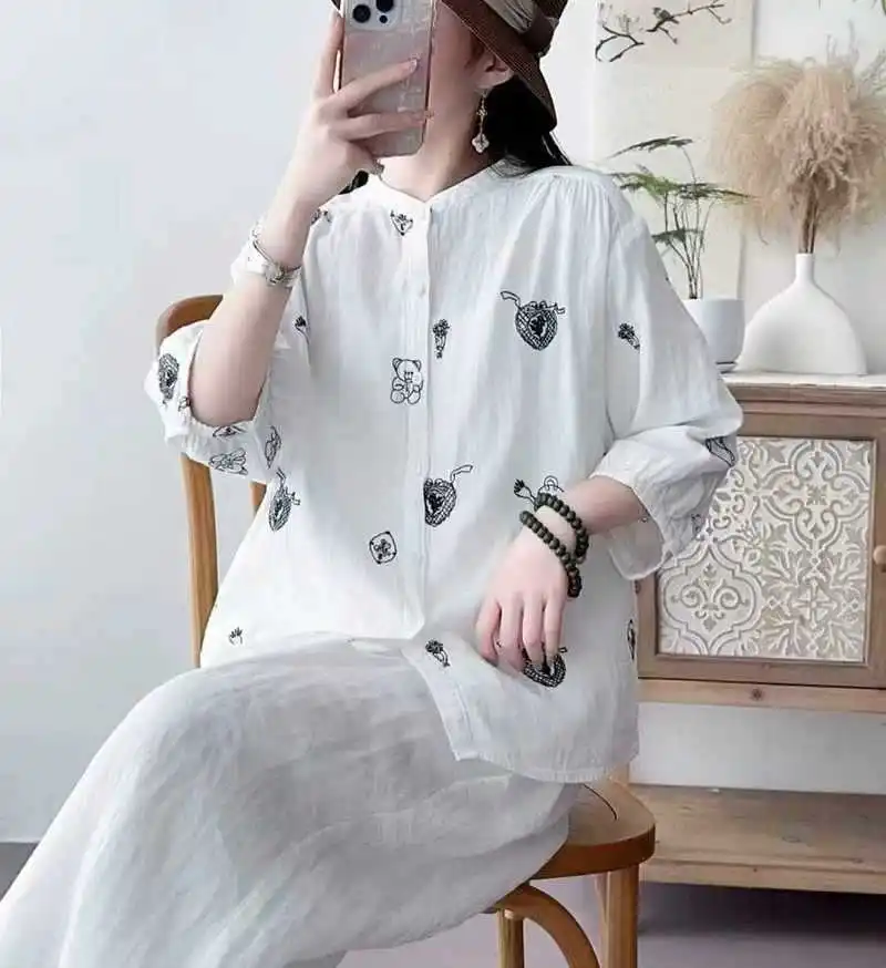 جديد 2025 قميص نصف كم من غزل القطن للخريف ، بلوزة فضفاضة للنساء مطرزة على شكل قطة ، بلوزة موري جيرل متعددة الاستخدامات للتنقل T59321CC