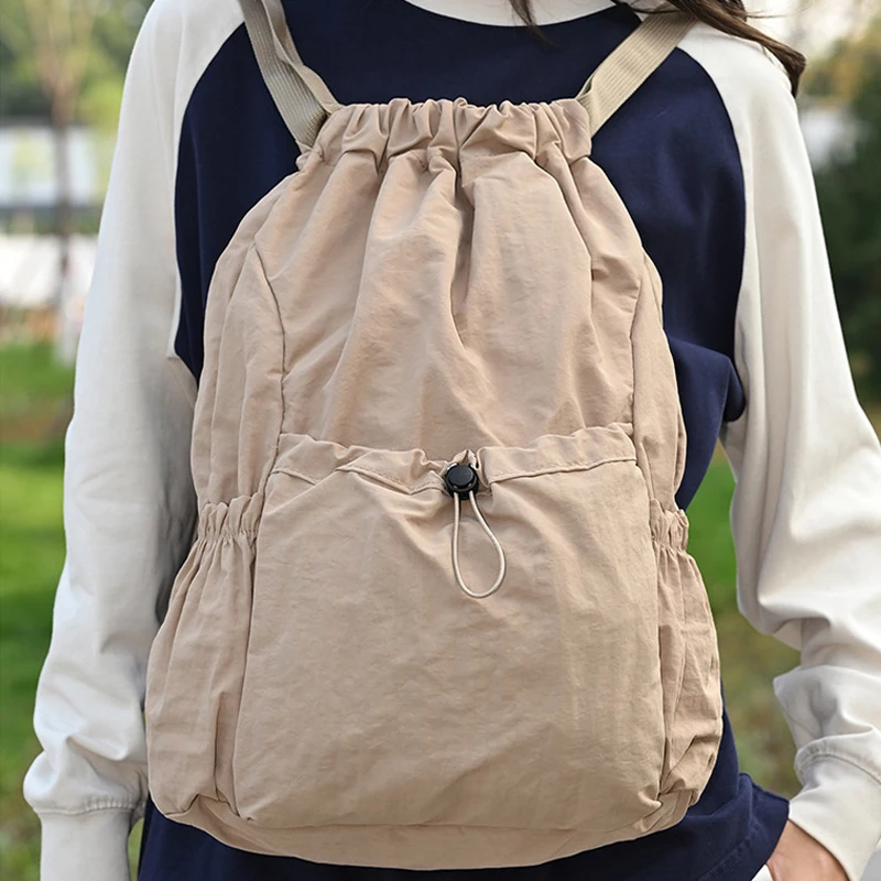 Mochila unisex, mochila escolar, tendencia para exteriores, ligera, de gran capacidad, impermeable, con cordón, bolsa de
