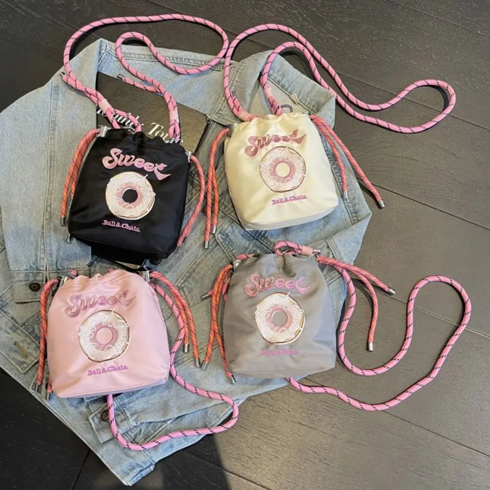 

Sweet Drawstring Bucket Bag Doughnut Pattern Shoulder Strap Nylon Crossbody Bag Cute Pattern Embroidery Design Cute Phone Bag