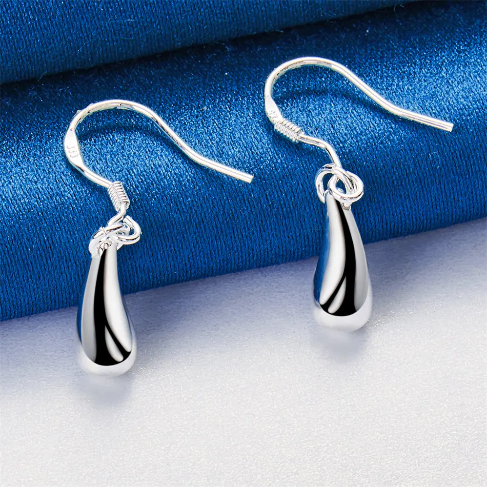A pair of exquisite 925 sterling silver sparkling water droplet pendant earrings for women's wedding accessories and fashionable