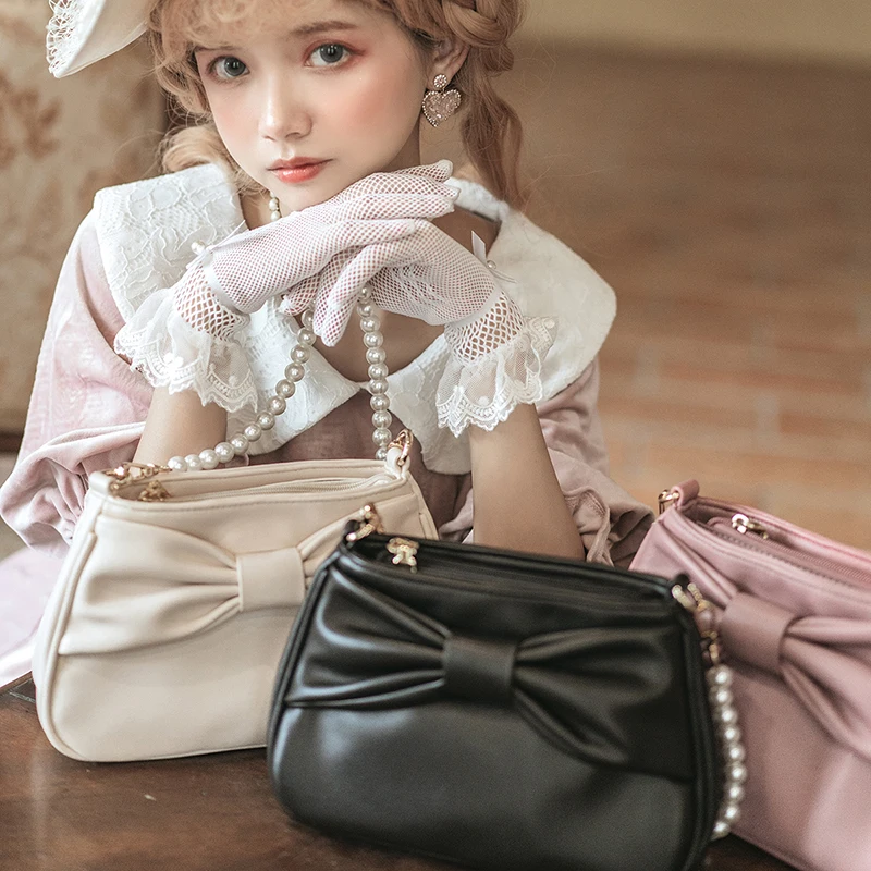 

Japanese sweet and cute elegant Lolita bow pearl chain bag for women original design female lo lady jk uniform armpit bags
