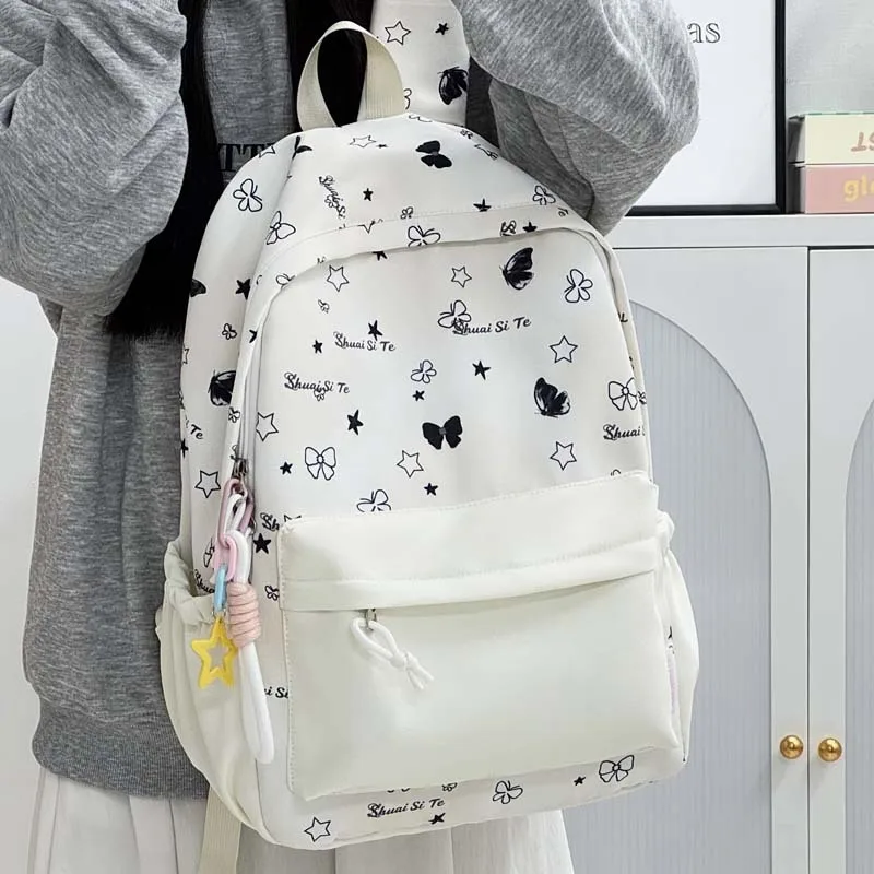 Back To School Backpack Playful Bow Print Bookbag Quilted Comfort and Multi-Pocket Organization System for Women's Campus Life