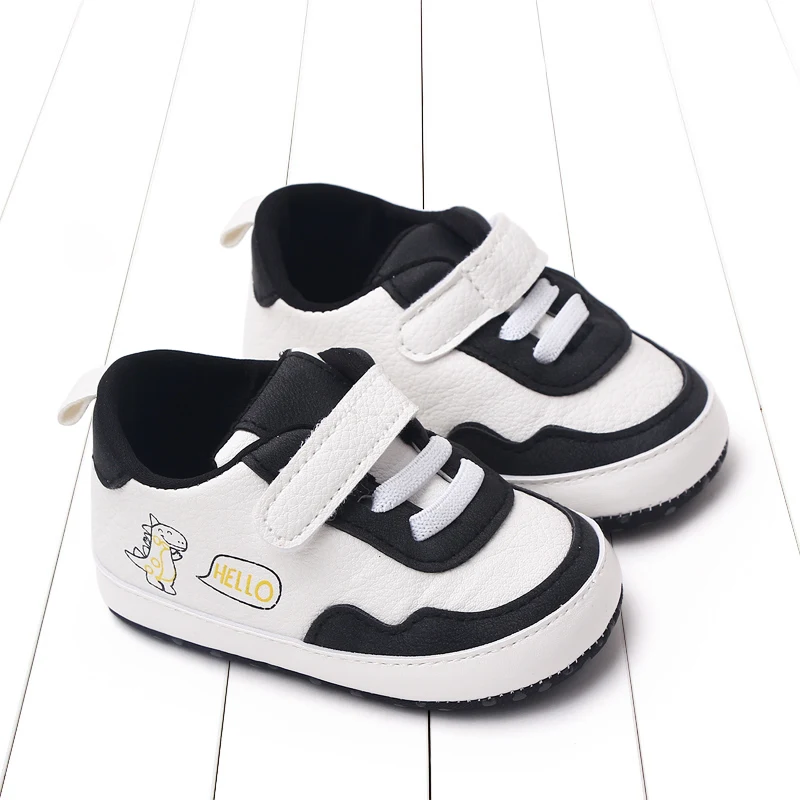 Scarpe per bambini di nuovo stile più vendute primaverili e autunnali per camminatori di apprendimento di dinosauri per bambini comodi con fondo morbido da 0-18 mesi