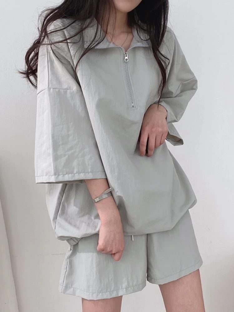 Conjunto de ropa deportiva informal a la moda, conjunto de dos piezas de plones cortos de pierna ancha con capucha y crem...