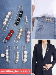 Jeans reduce waist circumference, safety pins secure clothes, suit jacket brooches, pearl buttons, pants cinch at waist
