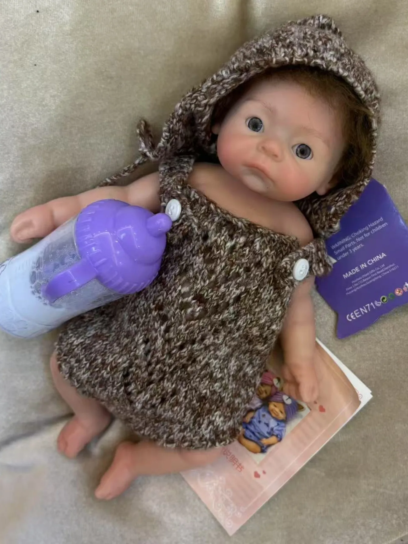 Aizwa1 Muñeca bebé recién nacida realista hecha a mano de silicona suave al tacto de 10 pulgadas con pelo enraizado muñeca bebé Reborn