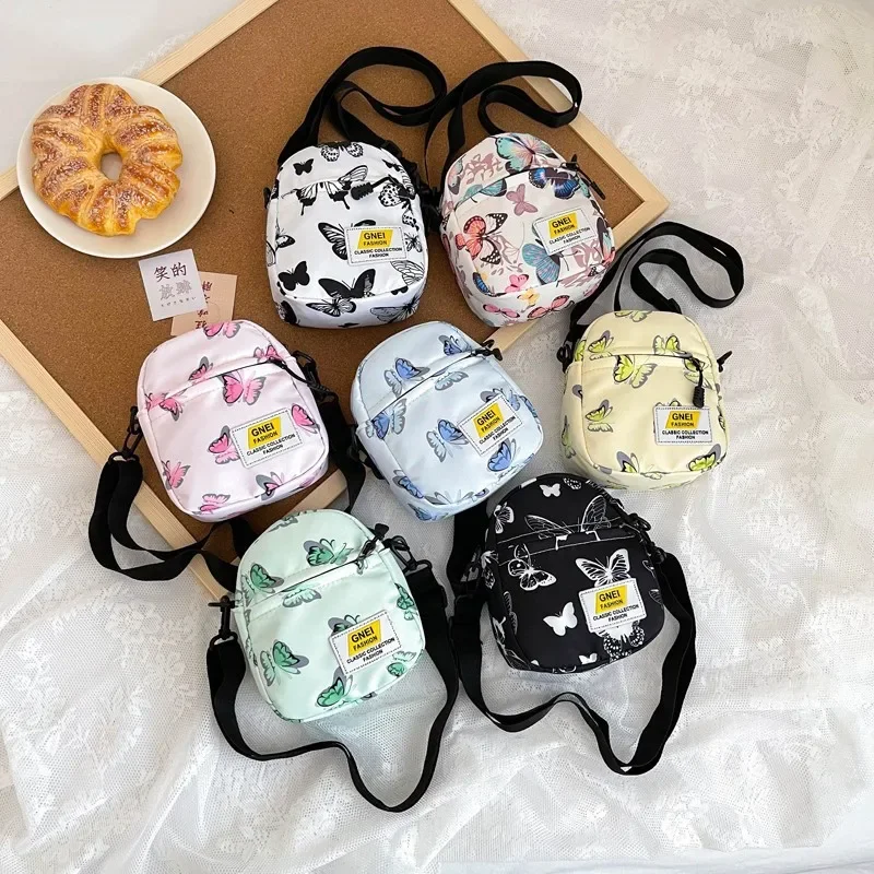 Mochila pequeña de mariposa de estilo americano para niños y niñas, Mini bolsa de mensajero portátil para monedas al aire libre, bolsa de juguetes para Earhpne, 1 pieza