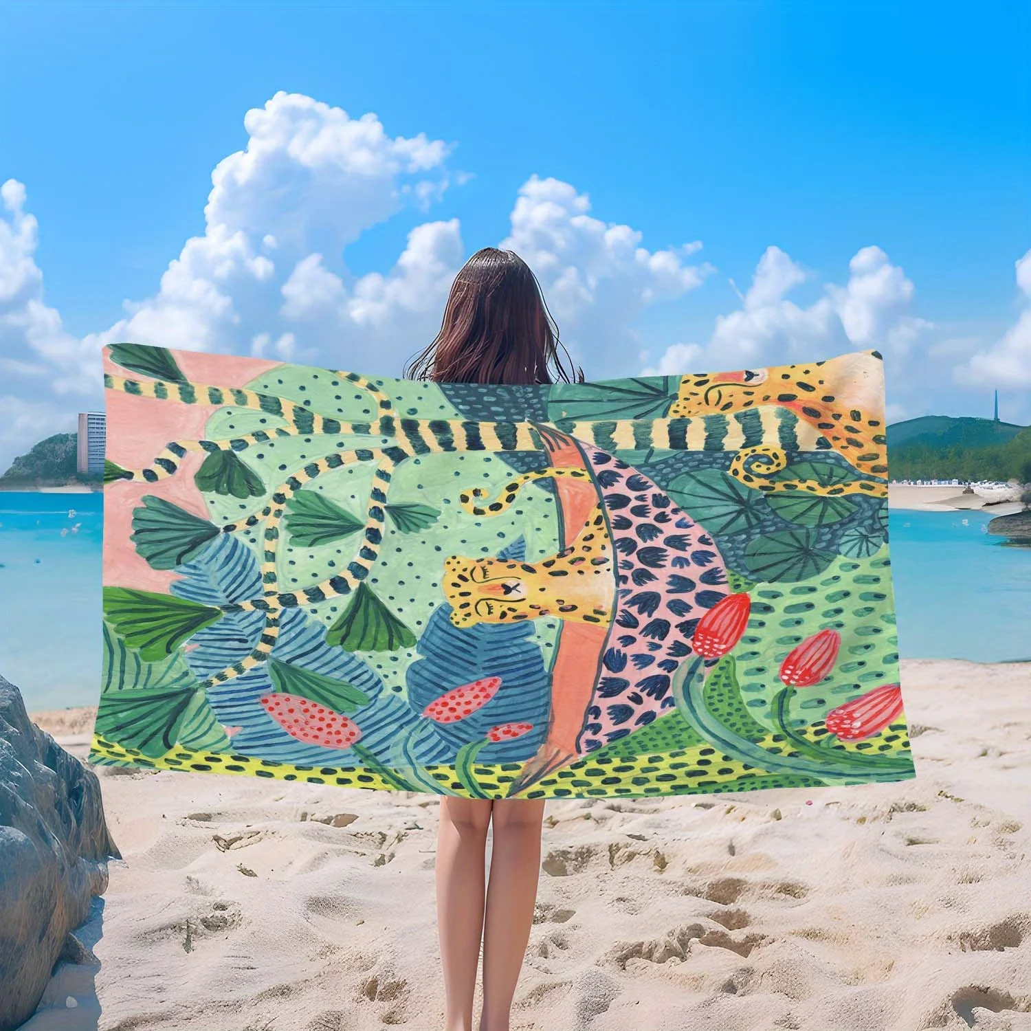 

One brightly colored tropical beach towel - of soft and lightweight microfiber, decorated with exotic leopard and floral prints