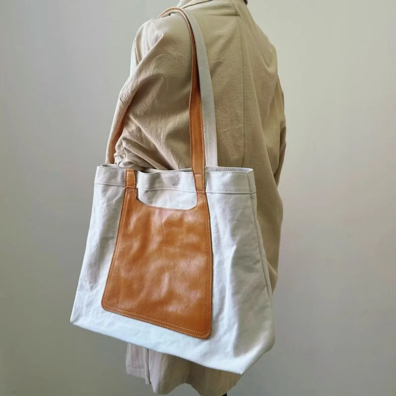AETOO A niche vegetable-tanned cowhide bag with canvas, a large-capacity single-shoulder underarm women's bag in contrasting col