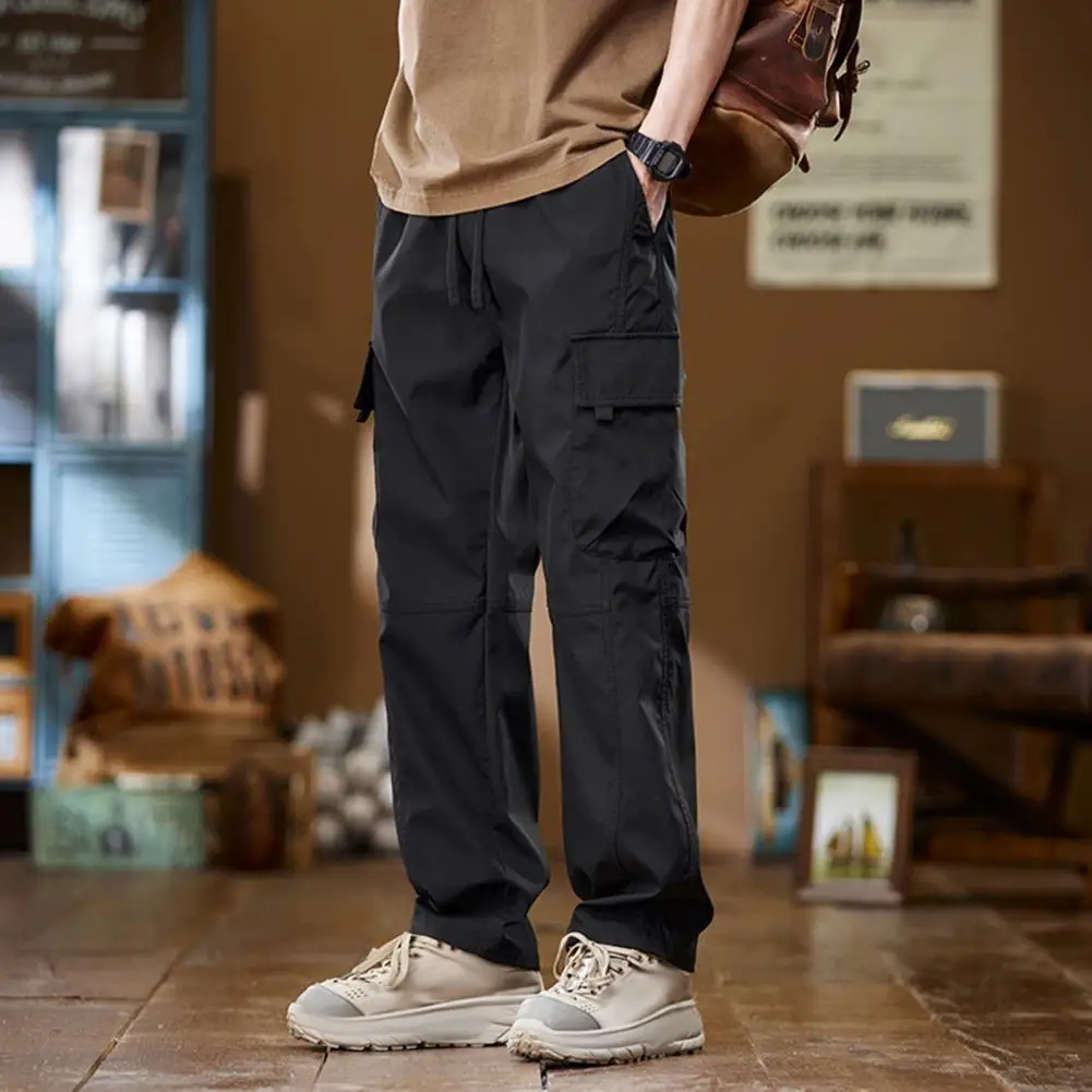 Pantalones de diseño ergonómico para hombre, estilo Vintage de calle alta, Cargo con cordón en la cintura, múltiples bolsillos para viajes al aire libre