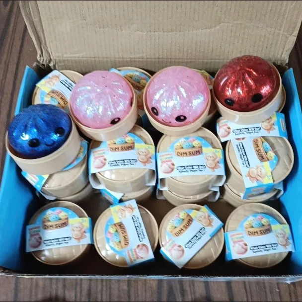 

5.7cm Simulated Xiaolongbao Squishy Toy with Face & Gold Glitter Beads Pull Stretch Blind Box Stress Relief toys