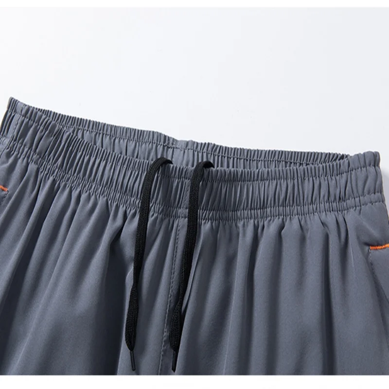 

2025 new reflective strip quick drying shorts for men, casual pants for men, beach pants for men, sports pants for men, running
