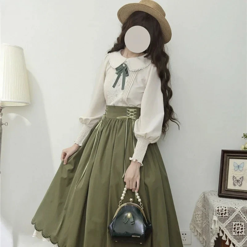 قمصان كلاسيكية أنيقة على طراز لوليتا للسيدات بلوزات مطرزة بالدانتيل بأكمام حلوة فستان بفيونكة لطيف للسيدات 2025 تخفيضات هائلة