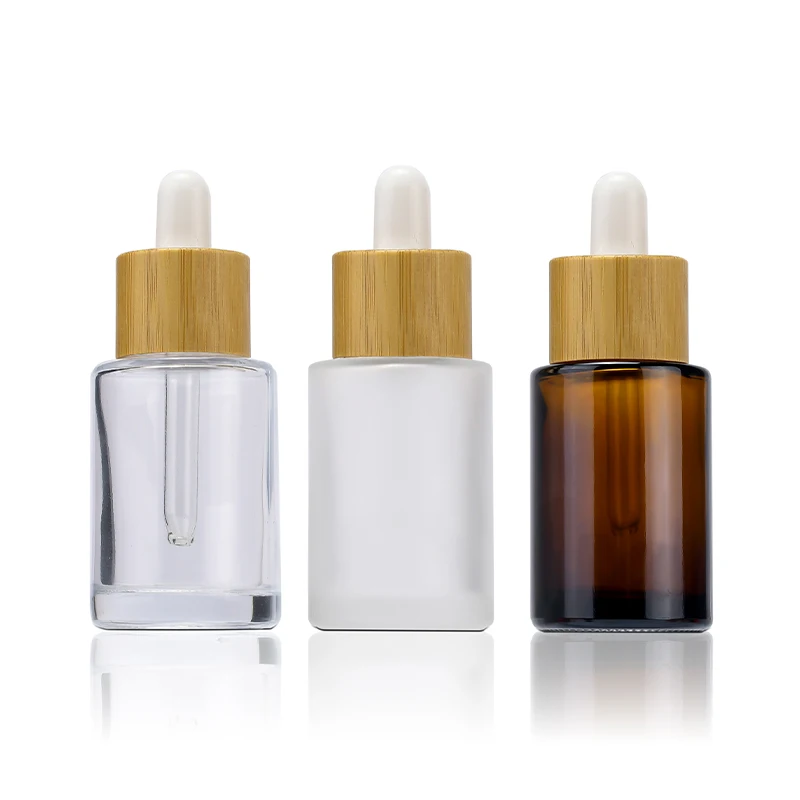 

20ml -100ml Natural Bamboo Packaging Flat Shoulder Amber Clear Glass Dropper Bottle with Bamboo Dropper for Essential Oil Serum