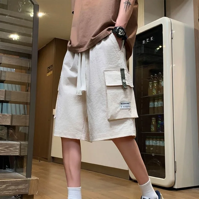 กางเกงขาสั้นสําหรับชายสีเขียวBaggyยืดหยุ่นเอวMens Half Cargoกางเกงขาสั้นStreetwearเสื้อผ้าElegantสบาย 2025 แฟชั่น