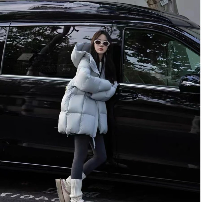 Autunno Inverno Giacca di cotone medio-lunga Donna 2025 Cappotto di cotone con cappuccio casual allentato di nuova moda Addensare tuta sportiva rosa femminile