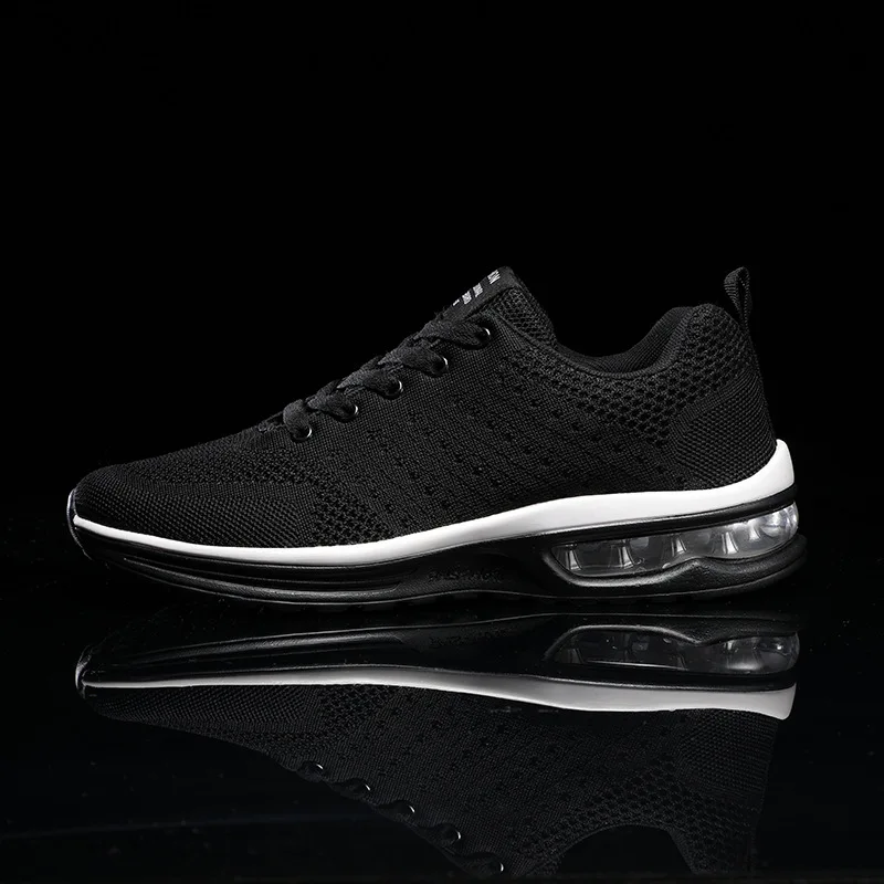 New casual fly-woven breathable and lightweight running large size air cushion shock-absorbing couple trendy sports shoes