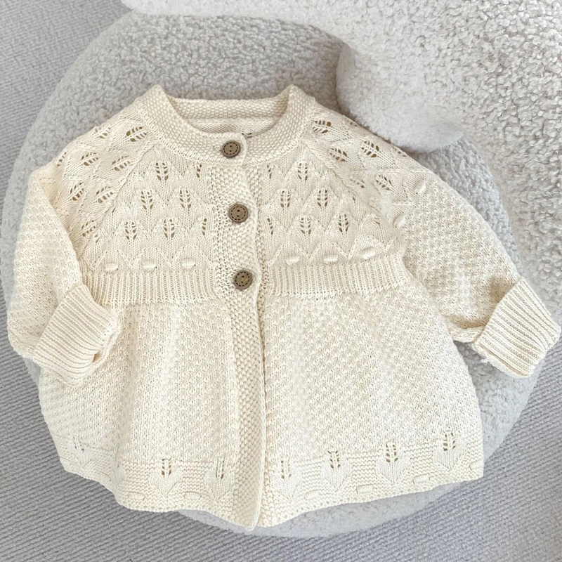 Autumn new baby clothing, 0-3 year old female baby sweater hollowed out knitted cardigan A-line versatile jacket outer layer