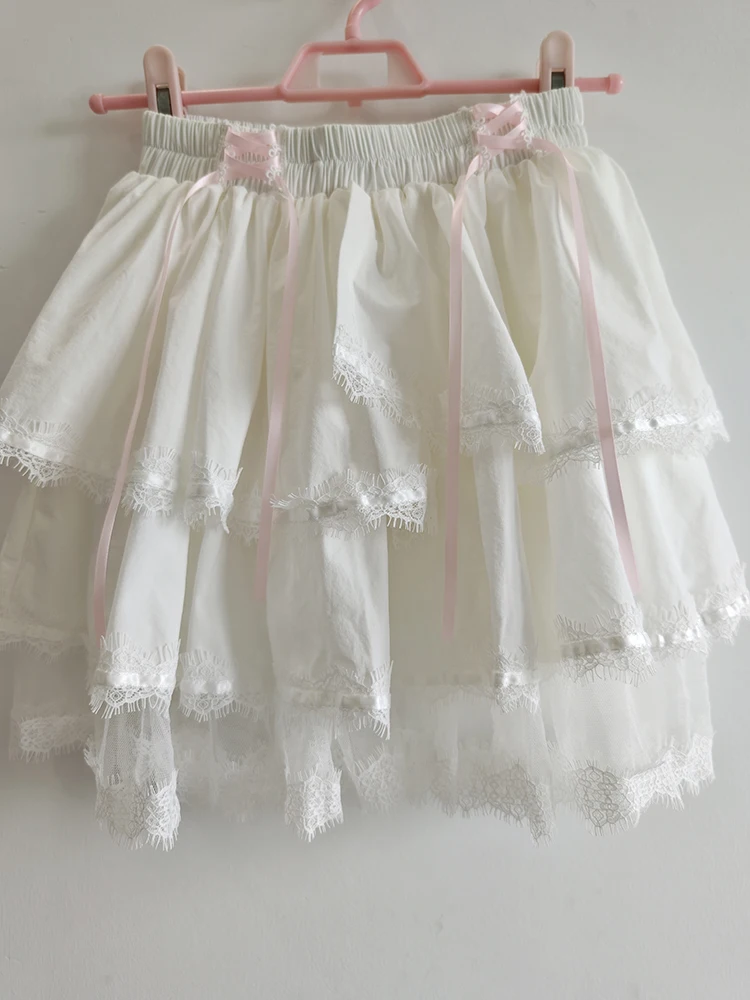 Mini jupes mignonnes pour filles douces, garniture en dentelle, décoration de nœud, taille élastique, short de style Lolita, vêtements Kawaii, été