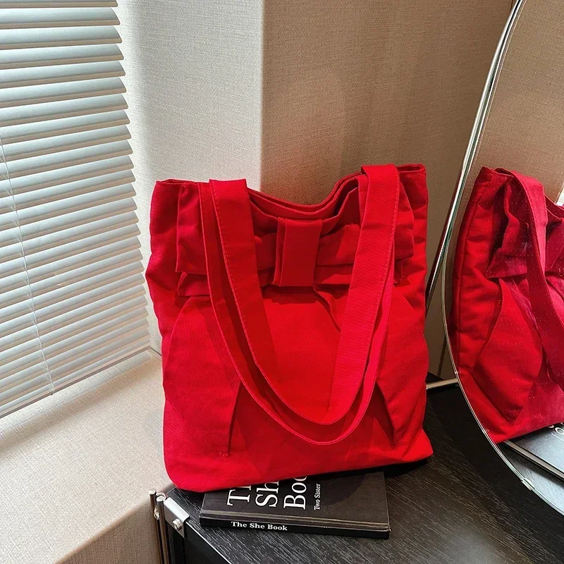 Canvas Material 2024 New Shoulder Bag Solid Color Bow High Capacity Simple Fashion Handbag Soft Versatile Popular Tote Bag