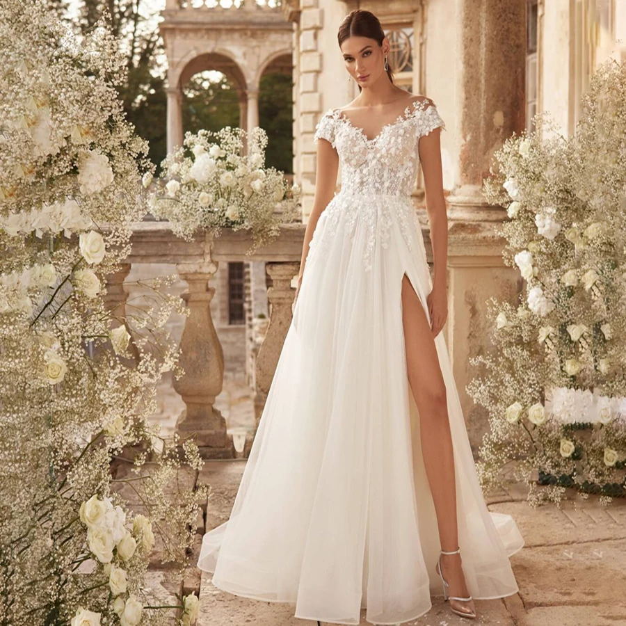

Customized New Designs A-Line O-Neck Cap Sleeve Wedding Gown Backless See Through Buttons And Zipper Bridal Gowns